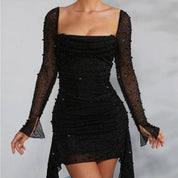 LYRAÉ – Luźna sukienka z dekoltem w kształcie V i nadrukiem