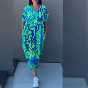 Monica | Elegancka sukienka w kwiaty zapewniająca romantyczny i wyrafinowany wygląd